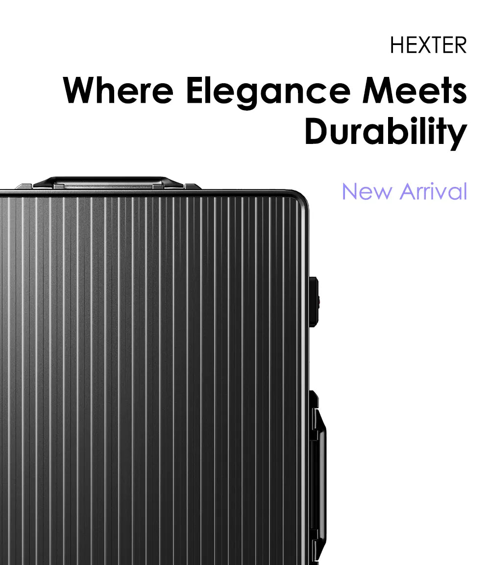 Promotional image featuring a black ribbed aluminium luggage standing upright on the left side of the frame. To the right, there's text in a modern font that reads "Where Elegance Meets Durability" above the word "HEXTER" in bold, followed by "New Arrival" in a smaller font. The background is white, emphasizing the suitcase and the text.